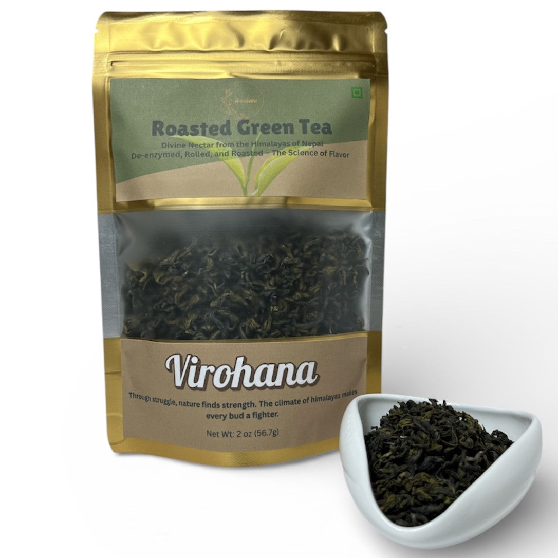 Virohana Roasted Green Tea package with tea leaves in a small white dish on a white background