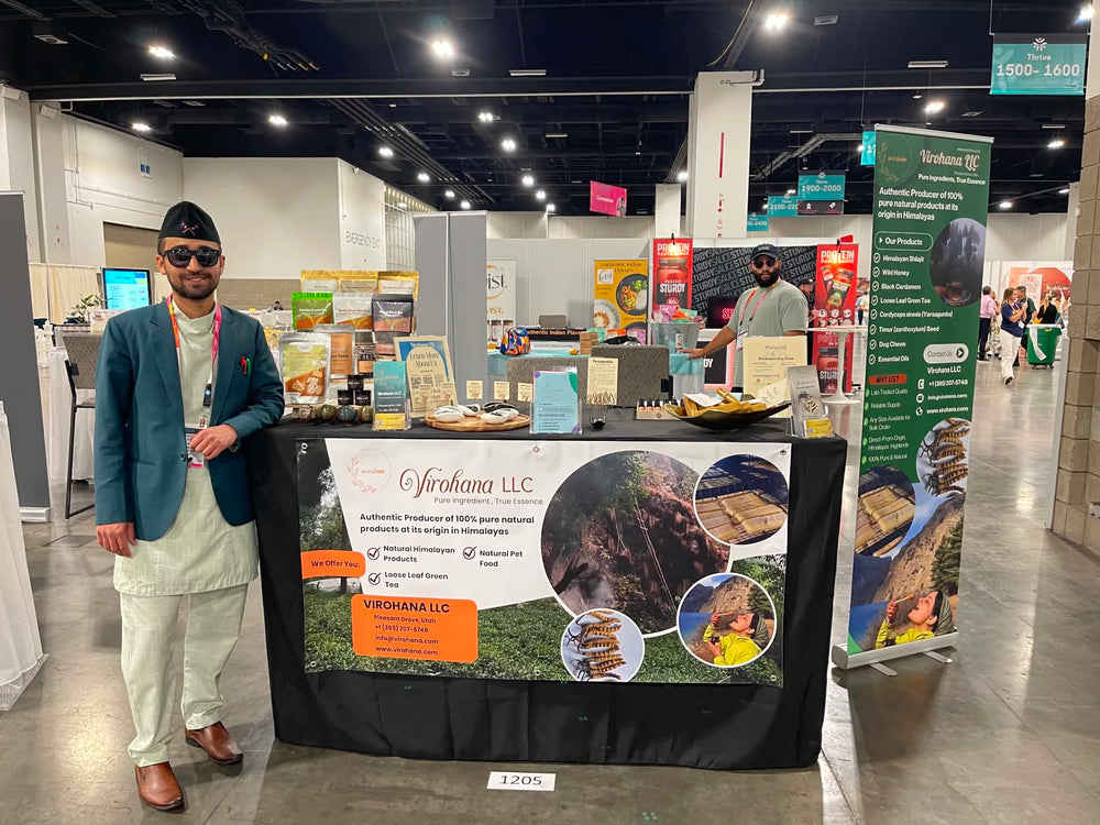 Co-founder of virohana in-front of virohana booth at Colorado convention center event